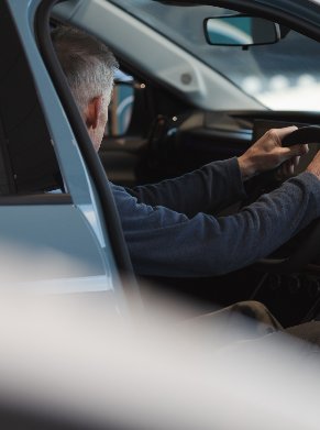 man in car