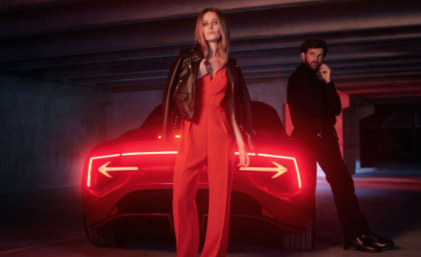 rear of the car with someone standing