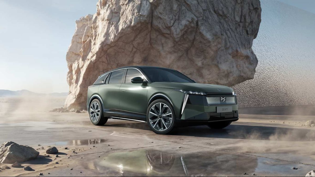 All-New DS No.7 SUV parked on rocky terrain with large boulder in the background.