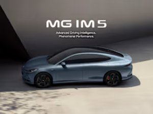 Sleek blue MG IM 5 car with promotional text above, viewed from the side.