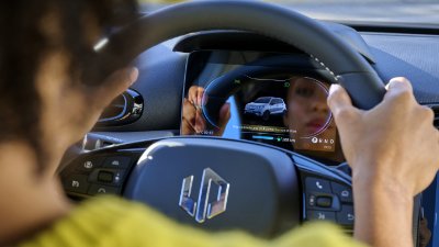 woman sat in the driver side of the car