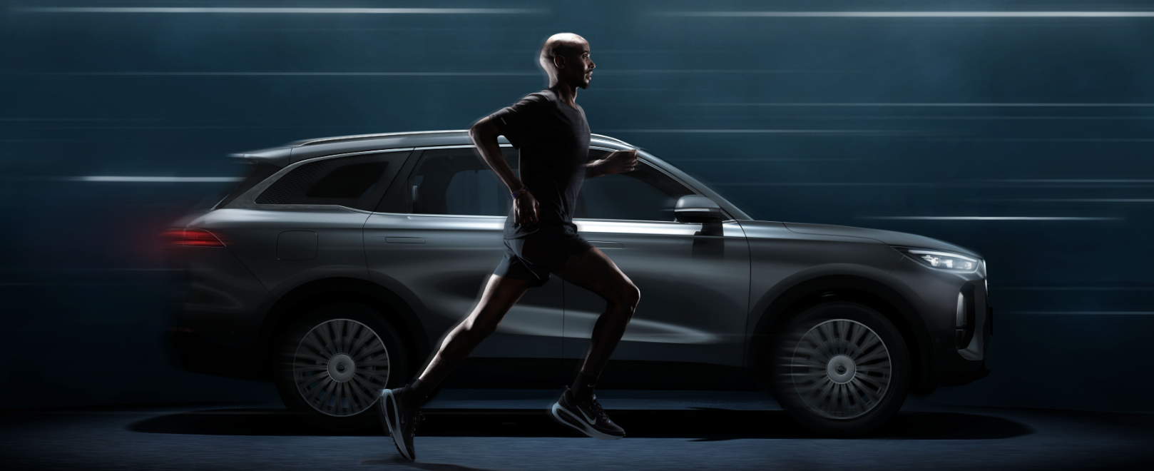 man running next to a car driving