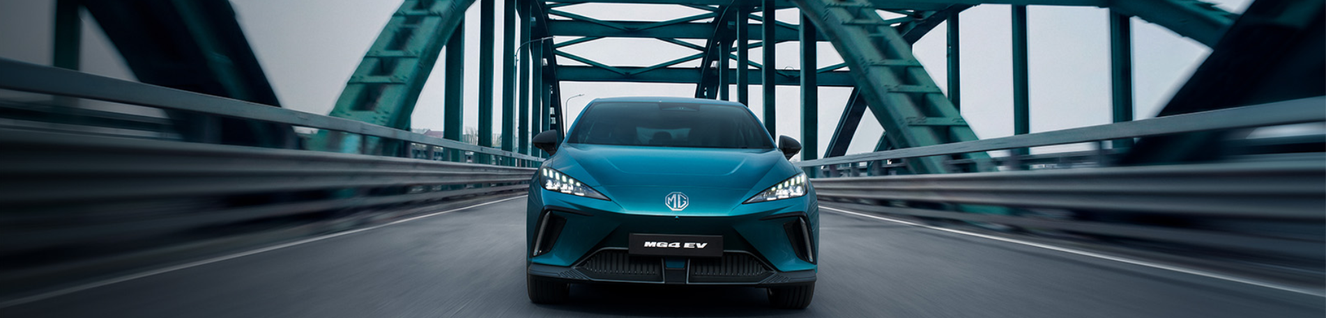 car face on driving fast on a bridge