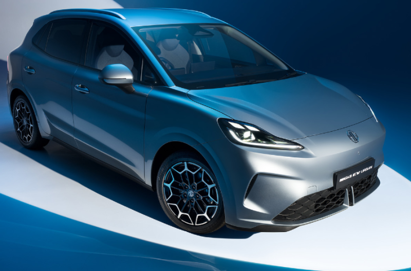 Car positioned on a studio set with lighting