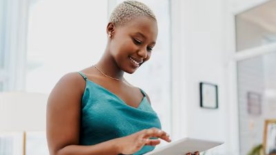woman looking on an ipad
