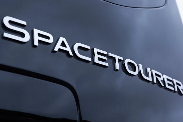 close up of the badge on rear of car