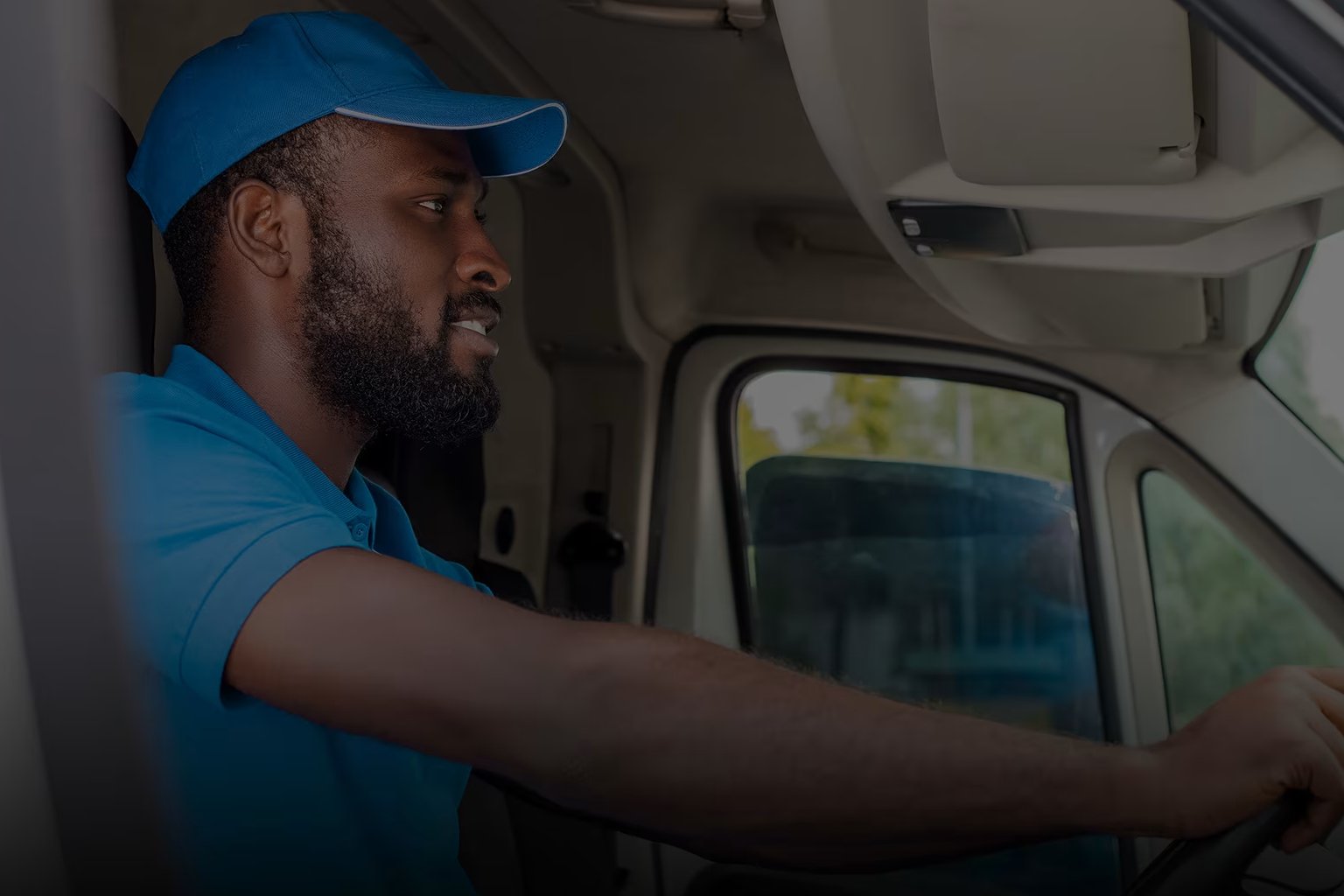 man sat in the front ogf van