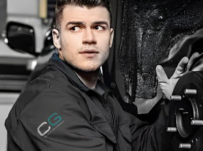 man looking at the front of car