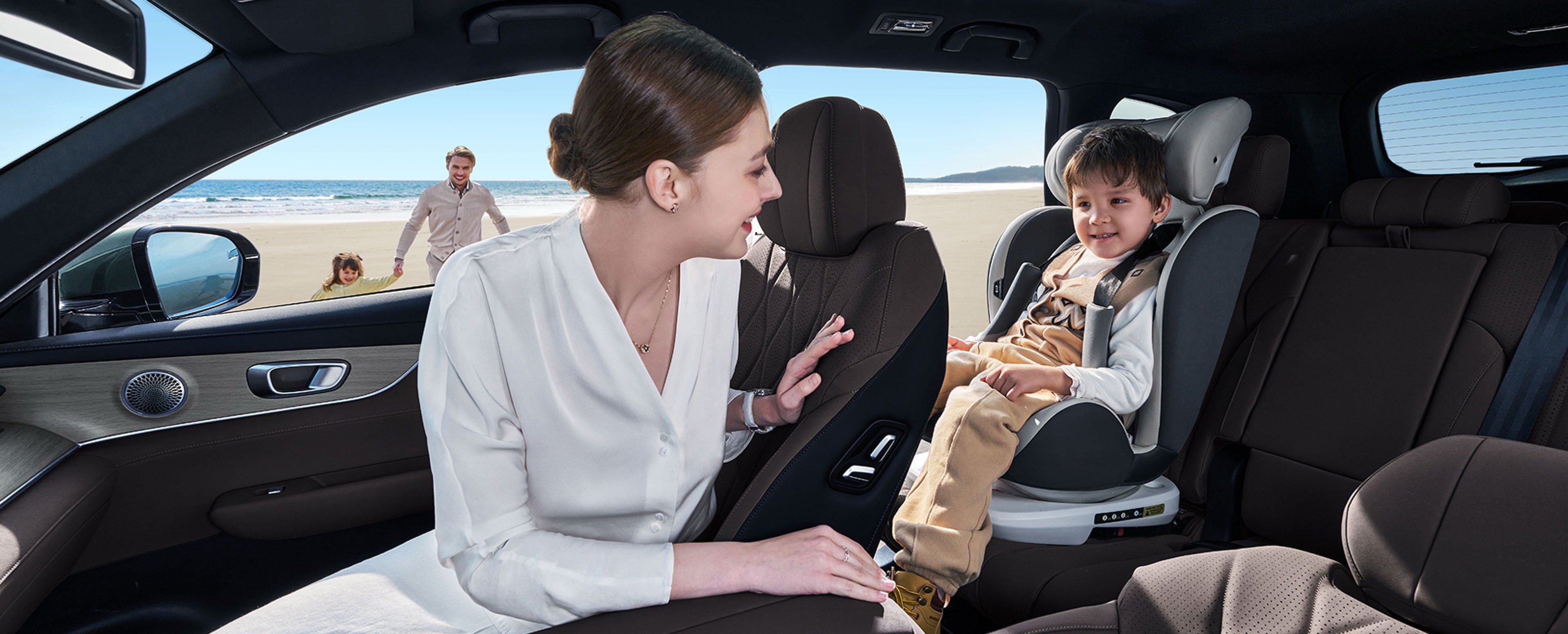 FAMILY IN THE CAR ON BEACH